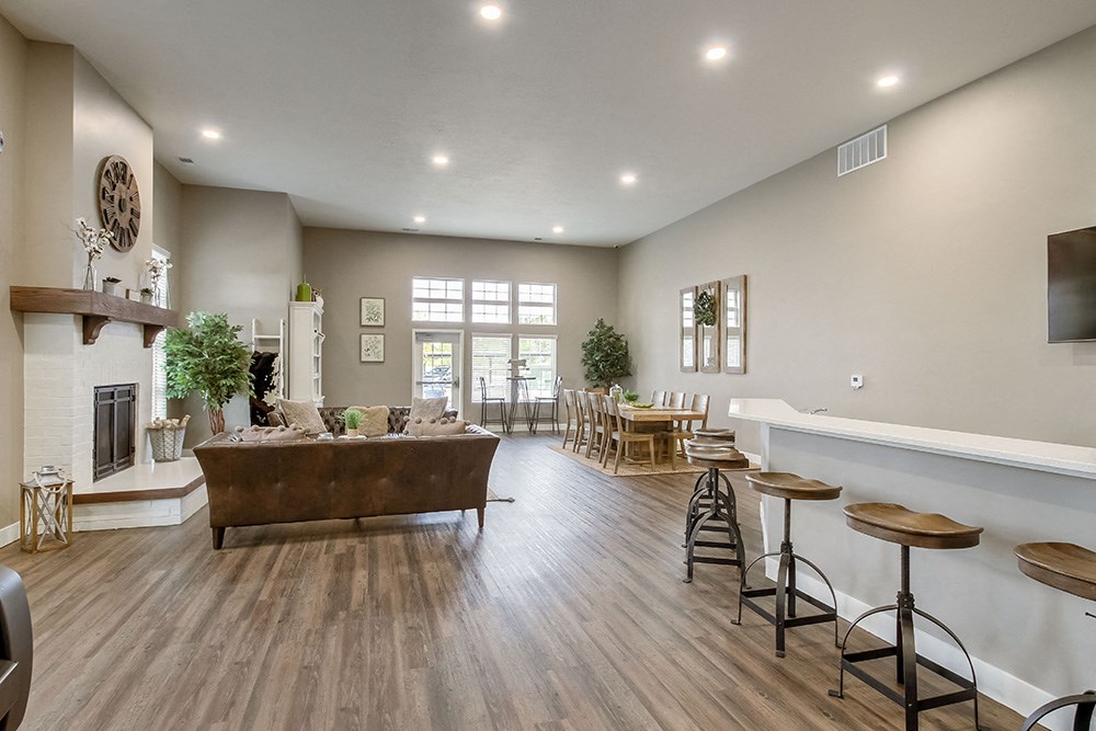 the reserve at bucklin hill leasing office resident lounge with fireplace and tv