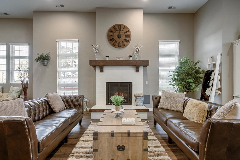 a living room with couches and a coffee table