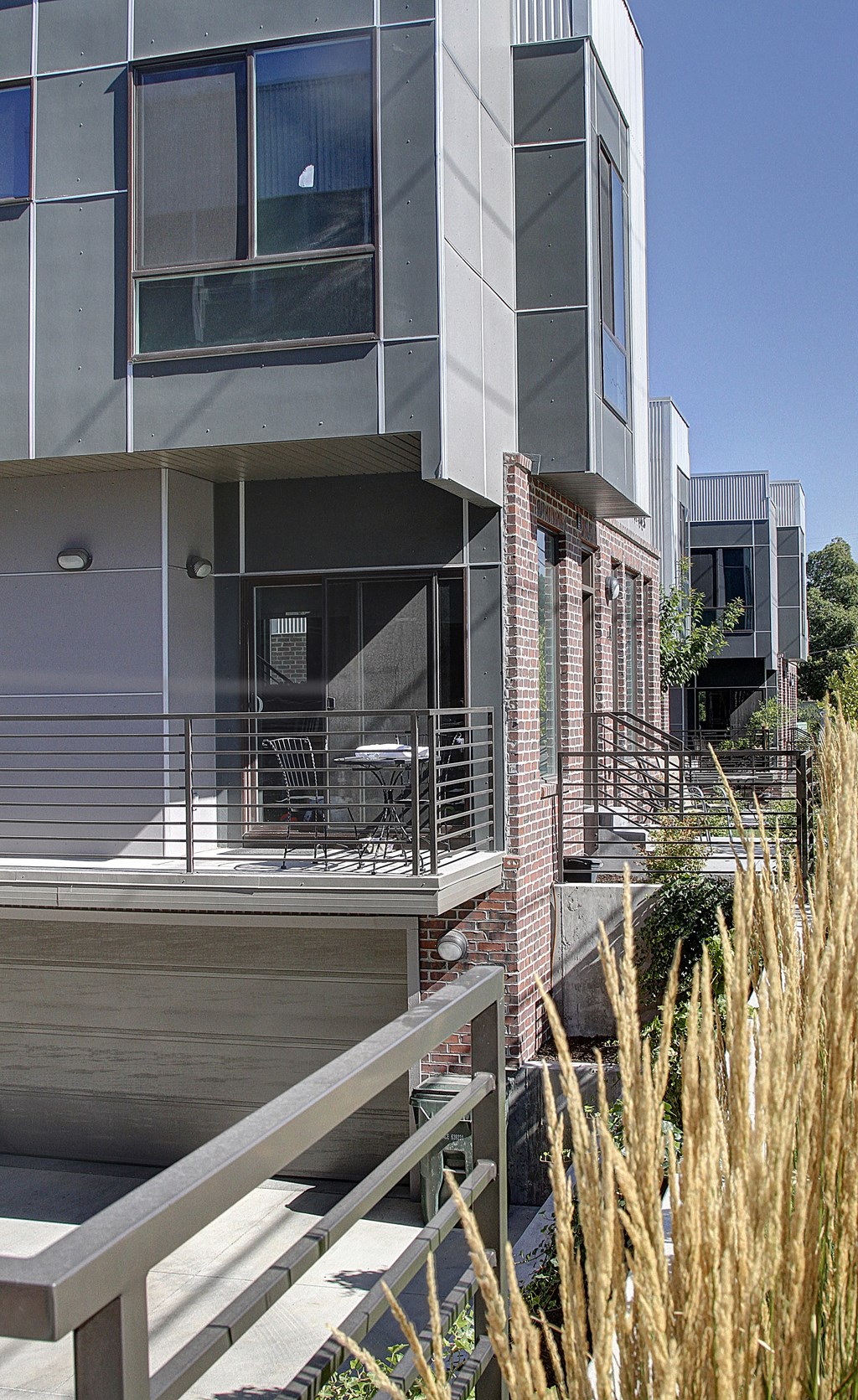 a view of an apartment building from a balcony at BlueKoi Townhomes for rent in Salt Lake City, UT