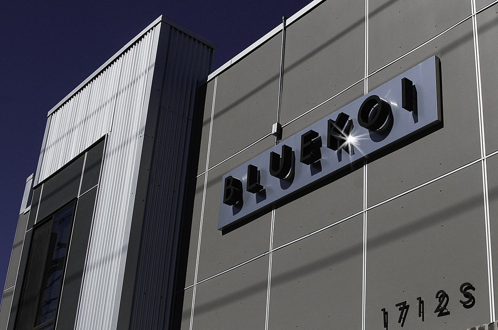 a building with a sign on the side of it at BlueKoi Townhomes for rent in Salt Lake City, UT