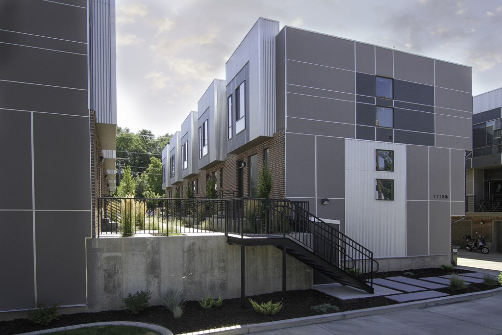 a view of a building with a staircase in front of it at BlueKoi Townhomes for rent in Salt Lake City, UT