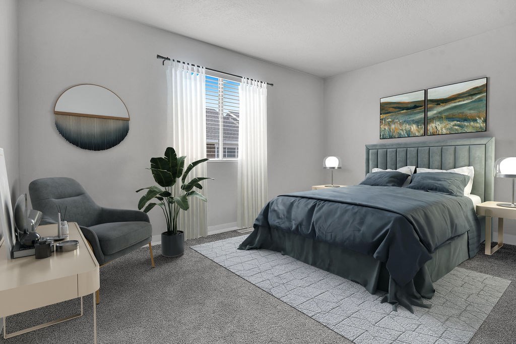 A bedroom with a large bed, a chair, a potted plant, and a painting on the wall.