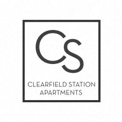 a sign that says clearfield station apartments