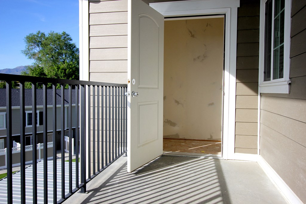 an open door on a balcony