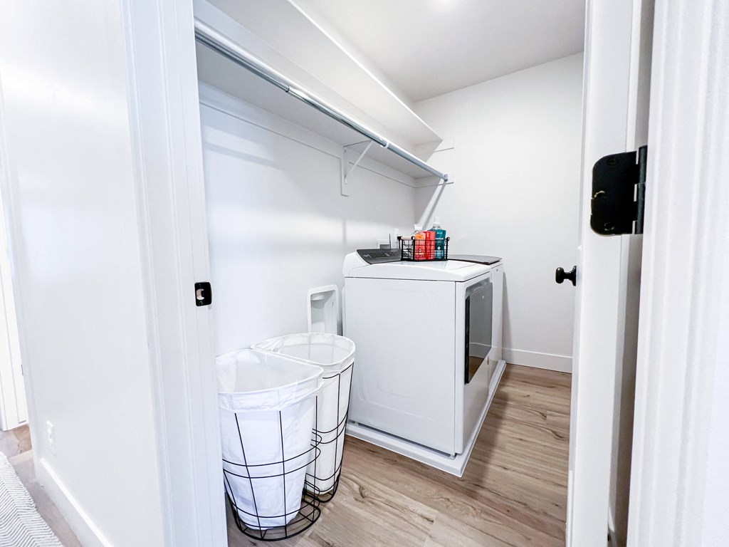 a laundry room with a washer and dryer