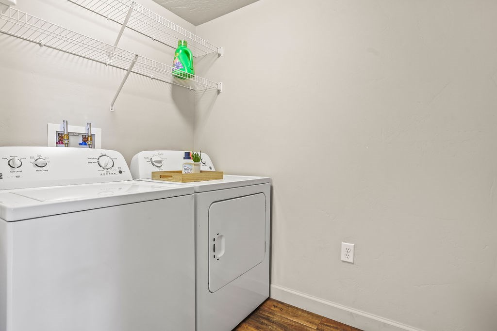 A laundry room with a washer and dryer.