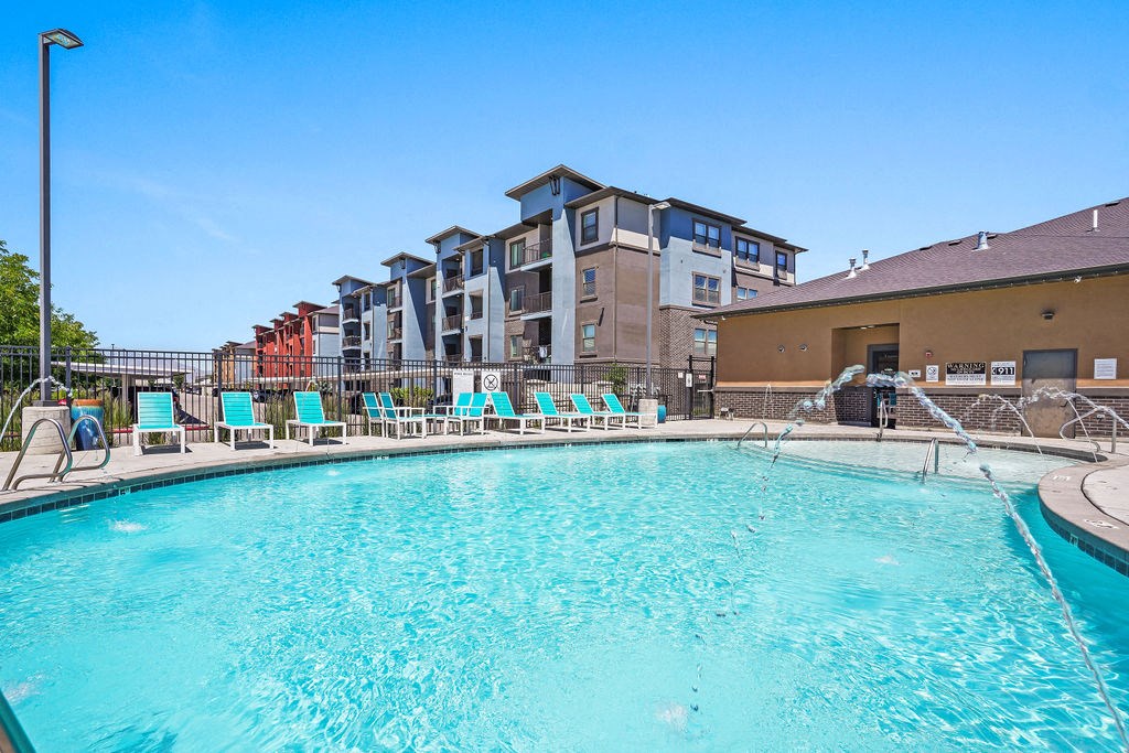 the swimming pool at the preserve at polk apartments