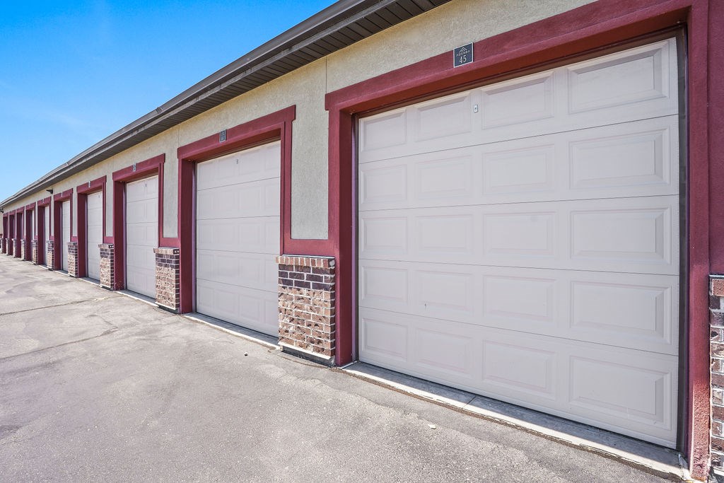 A row of garage doors are closed.