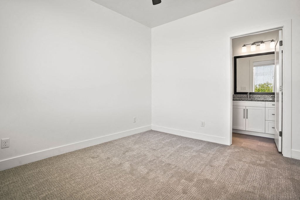 an empty room with a sink and a mirror  at Aero Luxury Townhomes in Layton, Utah