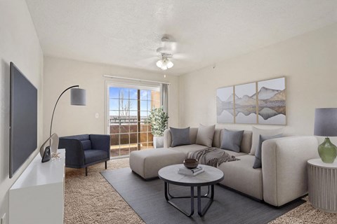 a living room with a couch and a table