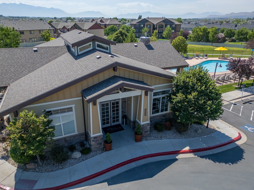 an aerial view of a house with a swimming pool at Aldara Apartments in Saratoga Springs, Utah