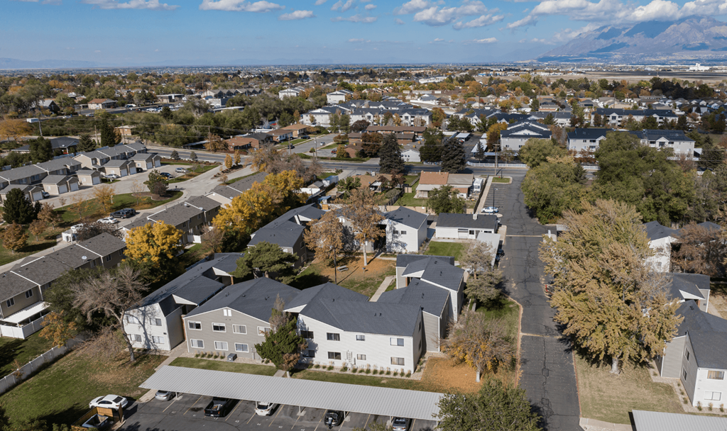 A suburban neighborhood with houses and trees.