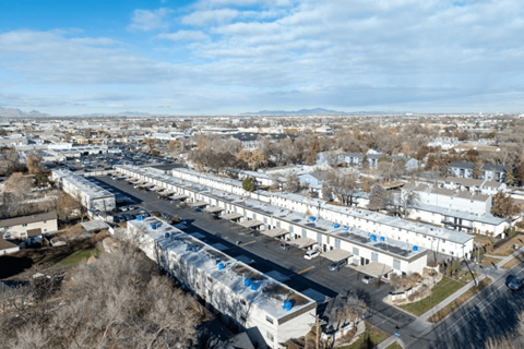 A train is passing through a residential area.