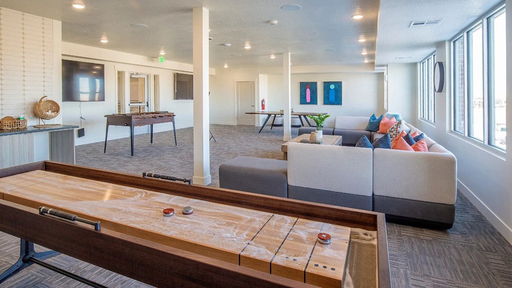 The Arlo | Game room with shuffle board, table tennis, foosball, and more