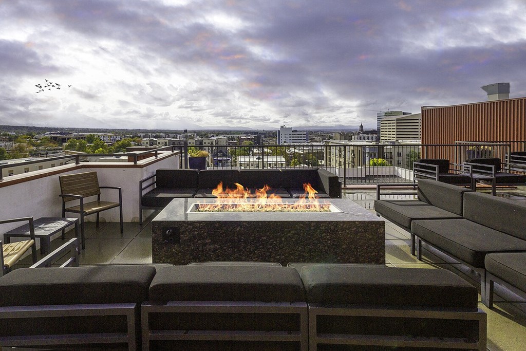 exterior fire place with couches at The Lotus Apartments in Downtown Salt Lake City, Utah