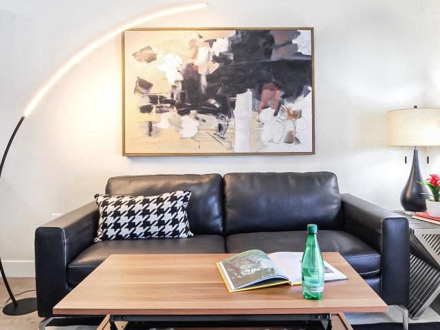 a living room with a couch and a coffee table