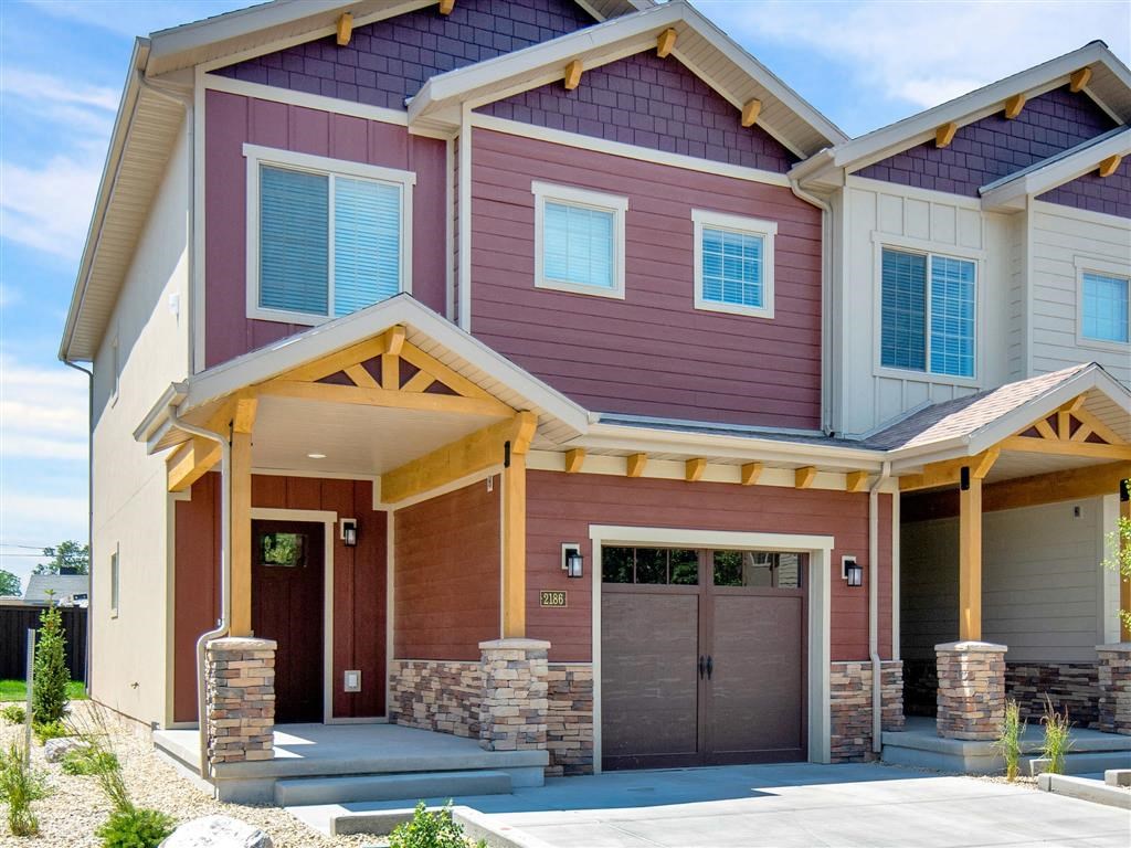 a house with a front porch and a garage