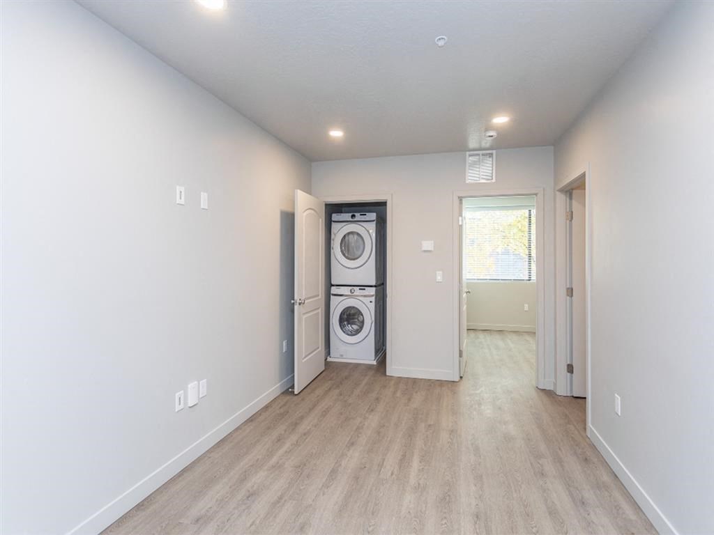 a laundry room with a washer and dryer in it