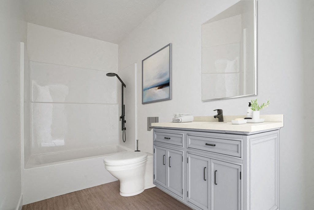 a white bathroom with a white toilet and a shower