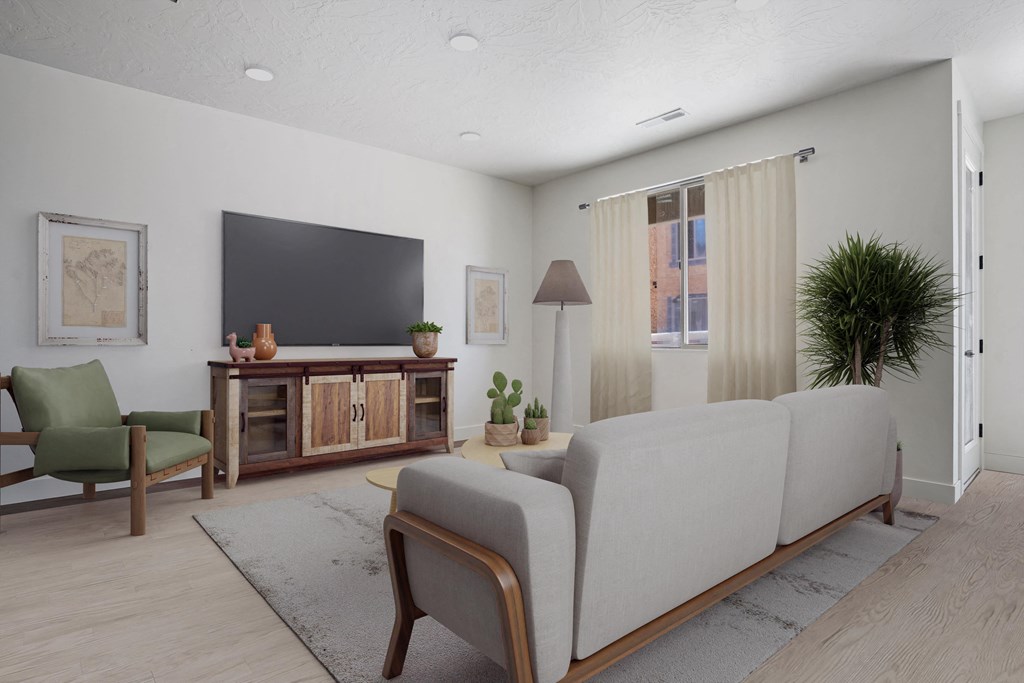 a living room with a couch and a tv