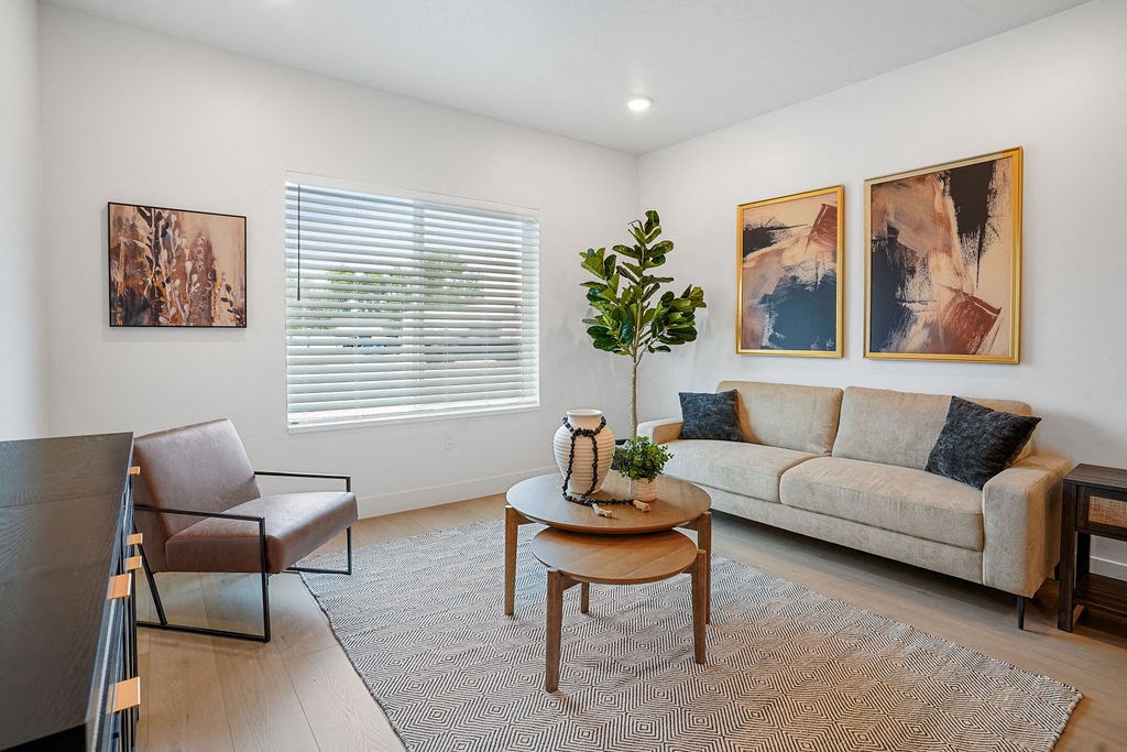 a living room with a couch and a table