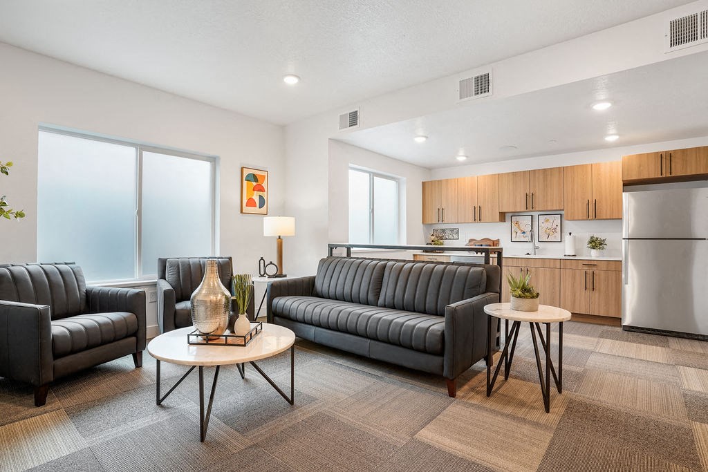 a living room with couches and a table