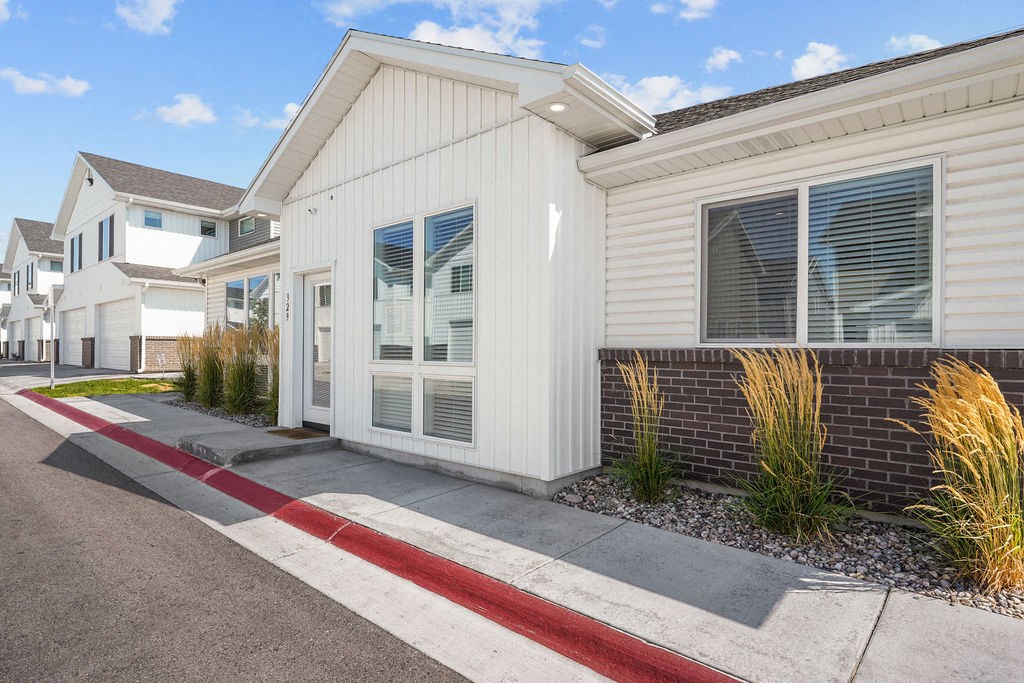 a building with a sidewalk in front of it