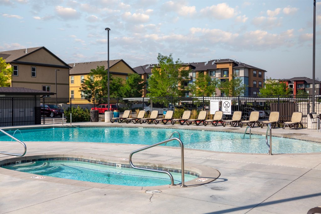 A swimming pool with a no swimming sign in the background.