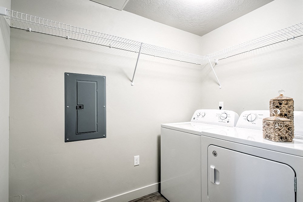 a laundry room with a washer and dryer