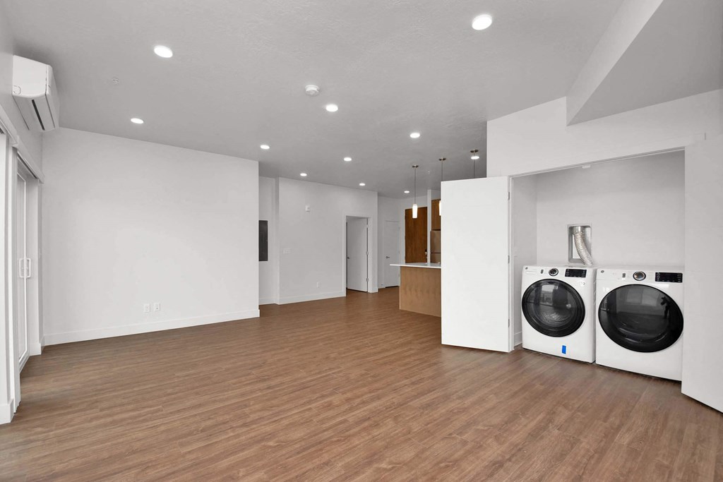 a laundry room with a washer and dryer