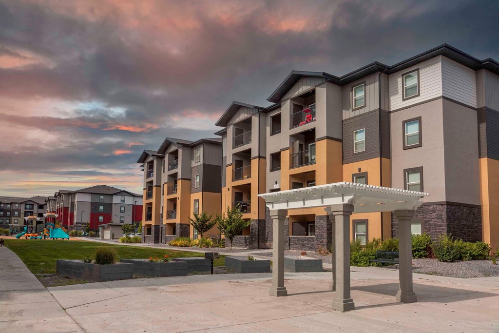 exterior view at dusk at the bradley braddock road station apartments