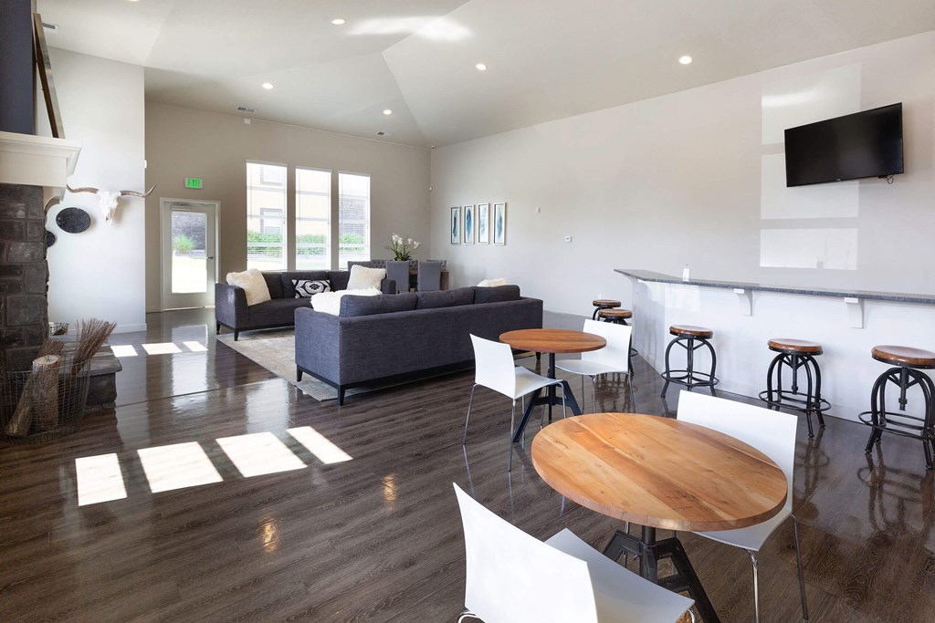 a living room filled with furniture and a fire place