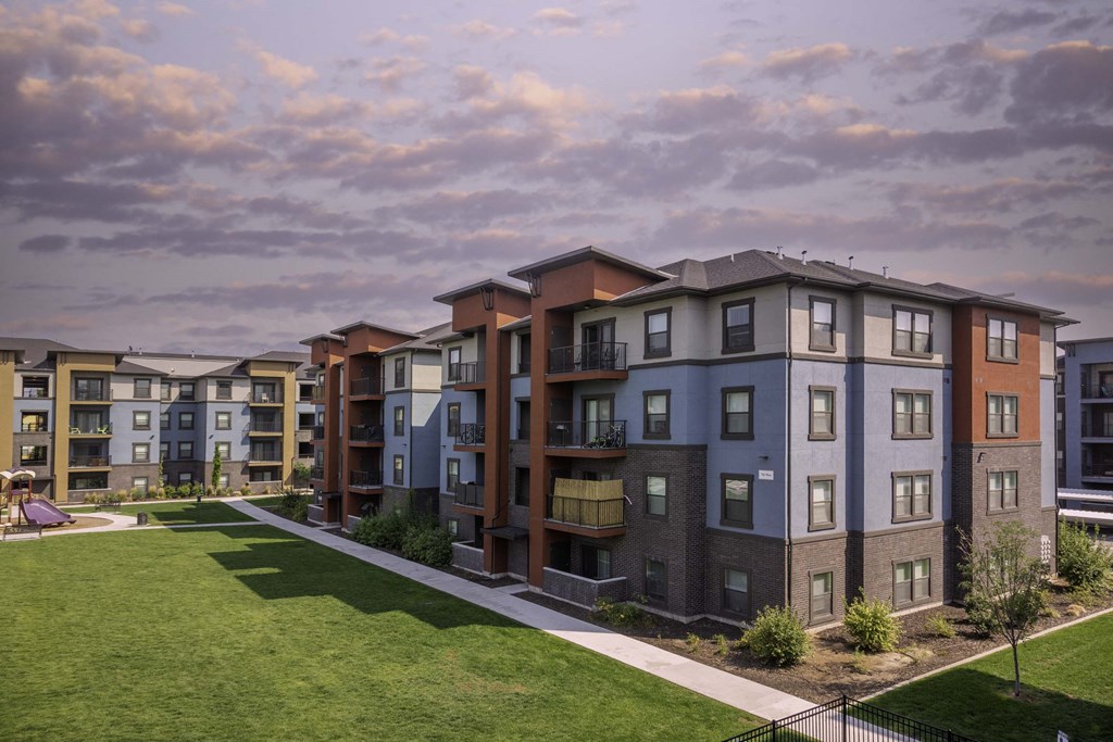 exterior view of the flats at big tex apartments in san antonio, tx