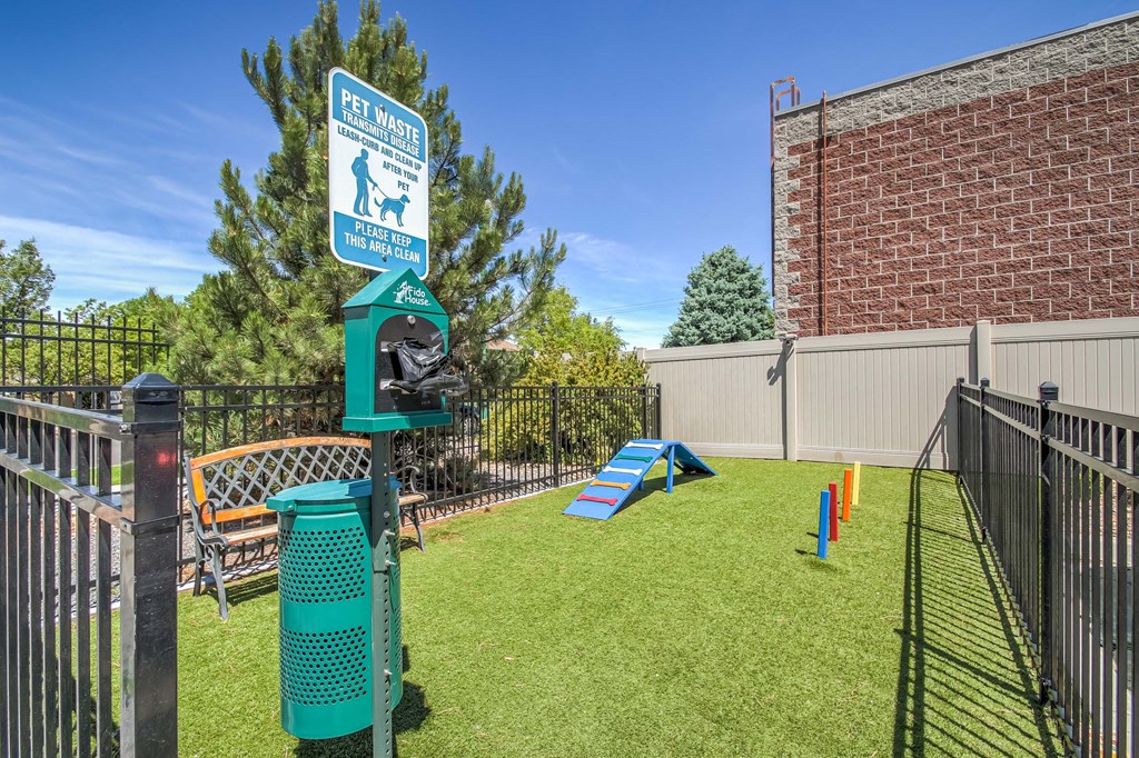 our apartments showcase a dog park with a playground