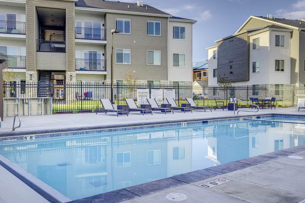 our apartments have a large pool with lounge chairs