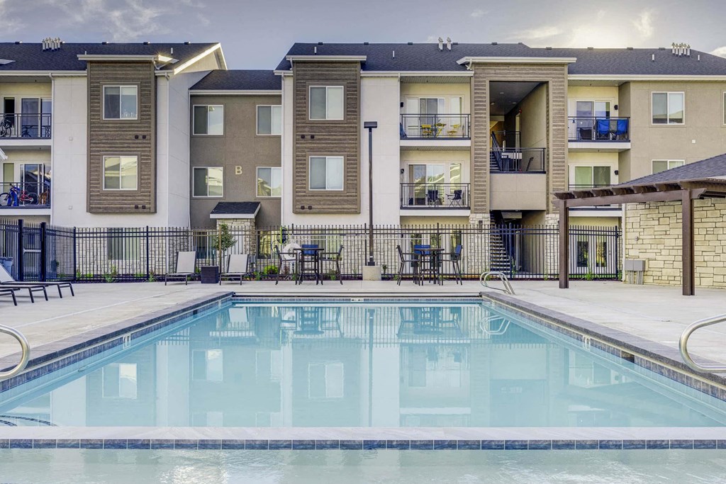 the swimming pool at the conclusion of the day at an apartment complex