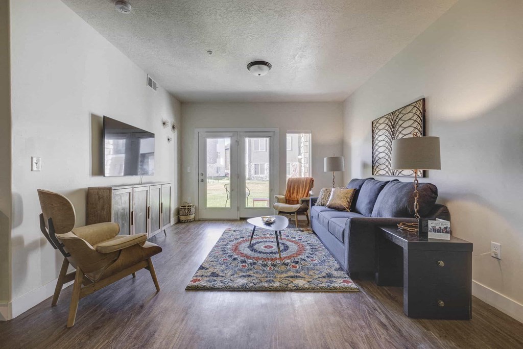 a living room with a couch and a table
