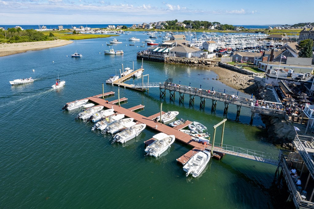 boats docked at a dock in a marina