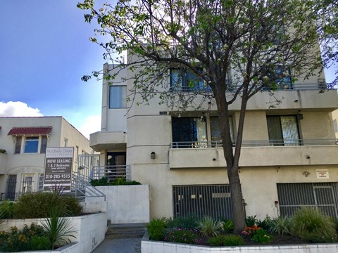 a building with a sign in front of it