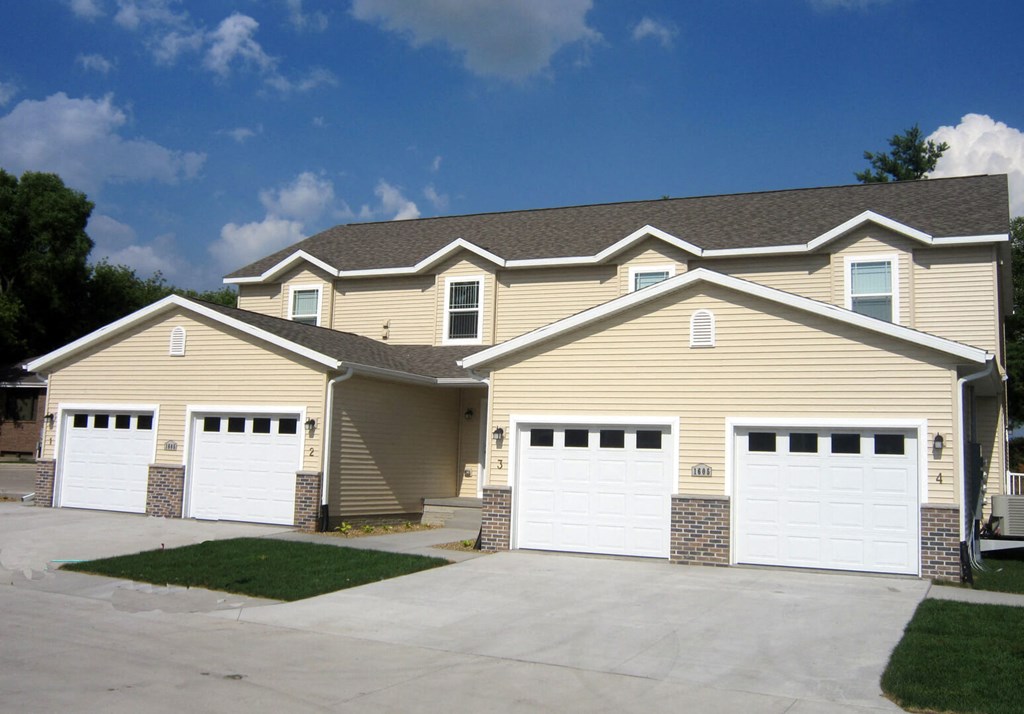 a house with a two car garage