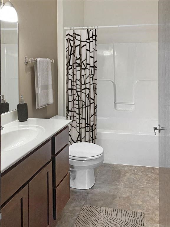 a bathroom with a toilet sink and bathtub