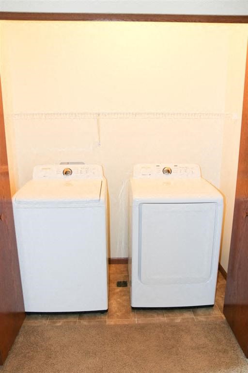 a white washer and dryer in a room