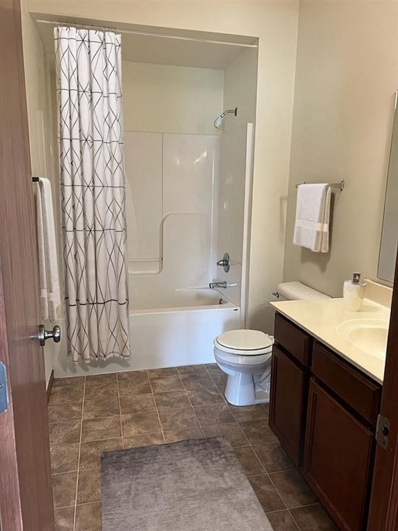 a bathroom with a toilet sink and bathtub