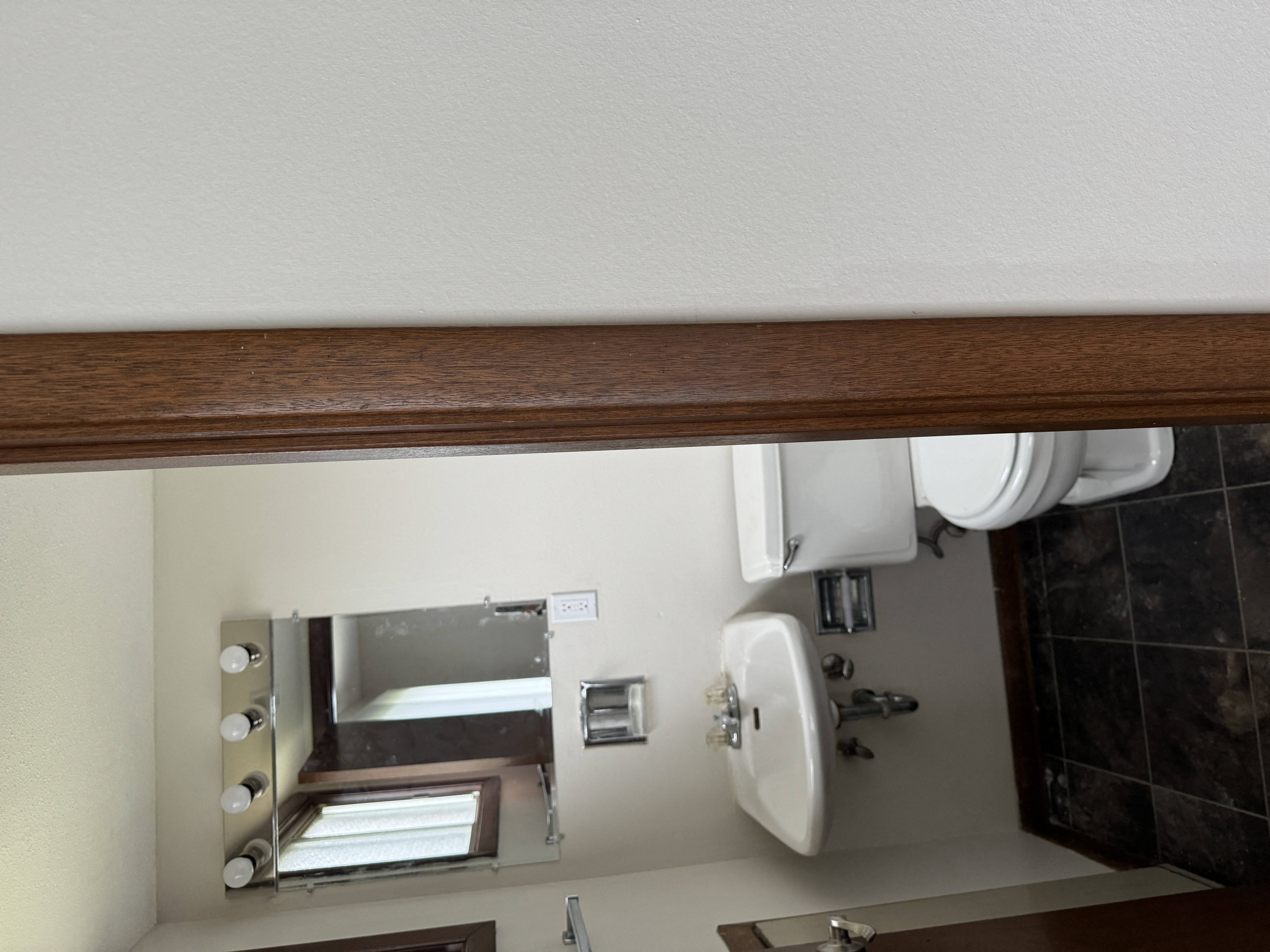 an overhead view of a bathroom with a toilet and a sink