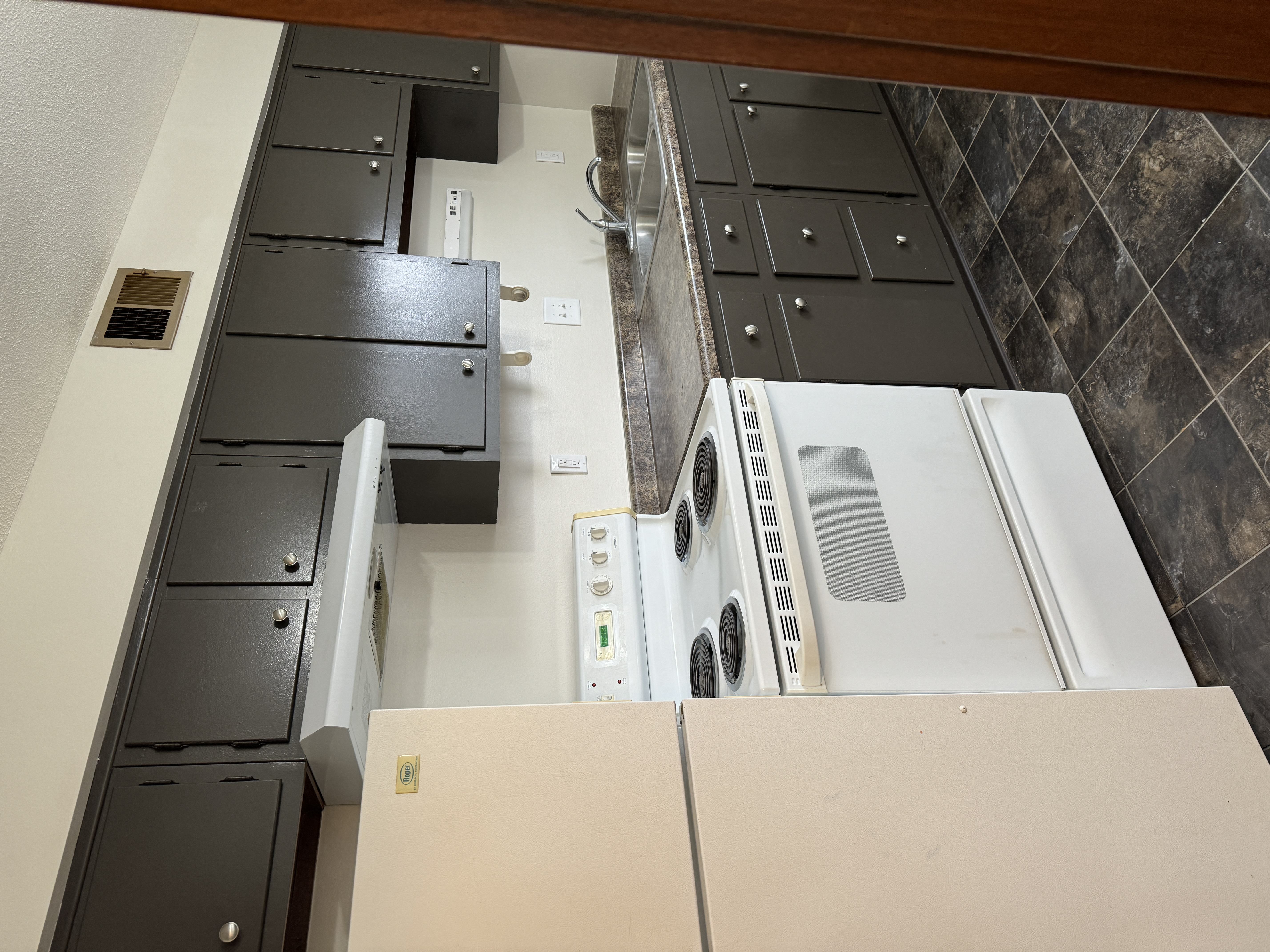 an overhead view of a kitchen with a bunch of appliances in it
