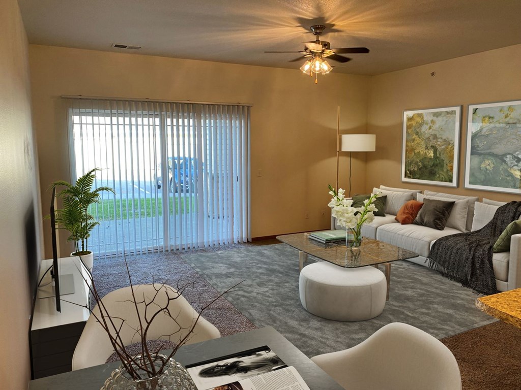 a living room with a sliding glass door