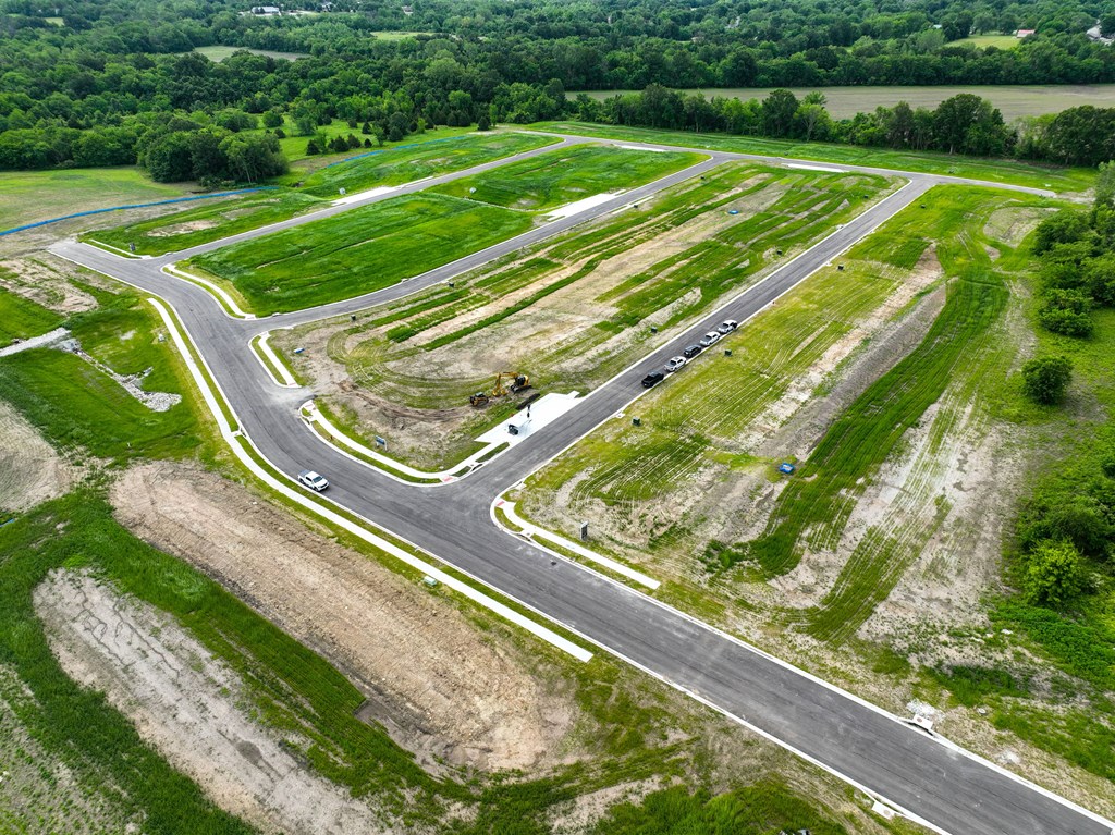 an aerial view of the intersection of a highway and an airport