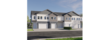 a house with two garage doors on a street