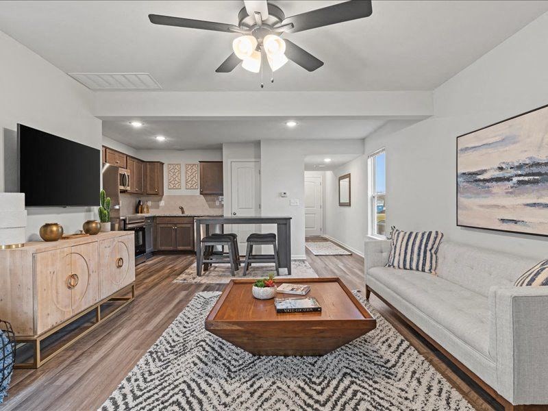 a living room with a couch and a table