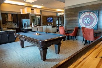 a billiards table in the clubhouse